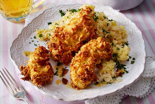 Ofenschnitzel mit Rahmkrautpüree Rezept Ofenschnitzel mit Rahmkrautpüree Rezept
