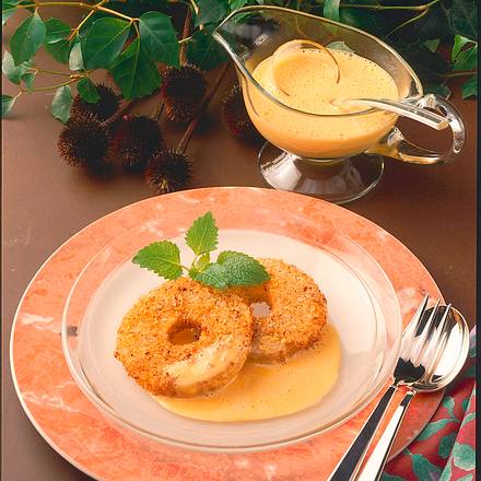 Apfel-Beignets mit Sanddorn-Honig-Schaum Rezept Apfel-Beignets mit Sanddorn-Honig-Schaum Rezept