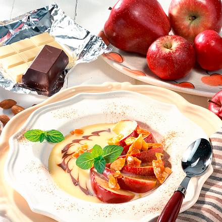 Apfelspalten in Cidre mit weißer Schokoladensoße Rezept