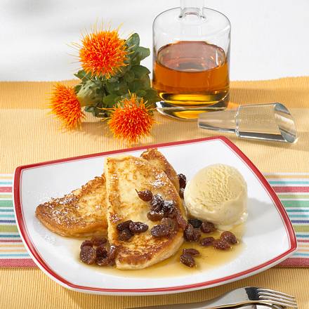 Beschwipste Arme Ritter mit Vanille-Eiscreme und Rumrosinen Rezept Beschwipste Arme Ritter mit Vanille-Eiscreme und Rumrosinen Rezept
