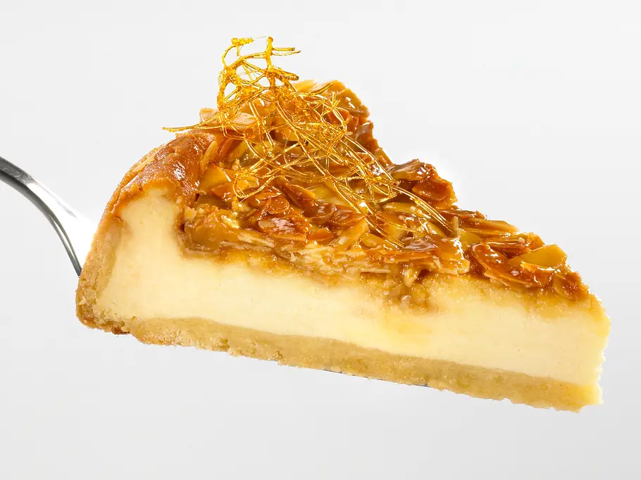Bienenstich-Käsekuchen mit Puderzucker Rezept Bienenstich-Käsekuchen Rezept