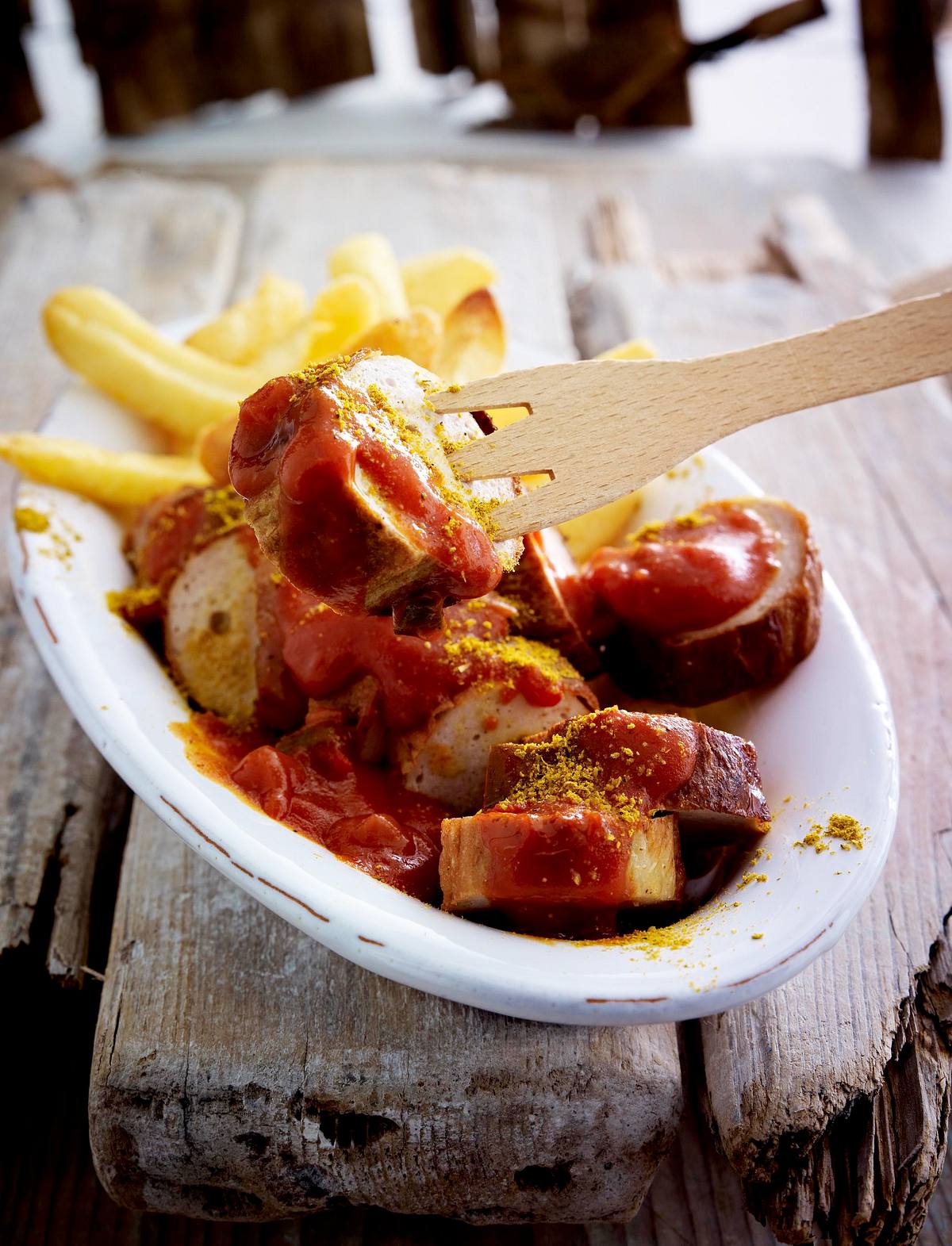 Currywurst mit Pommes frites Rezept