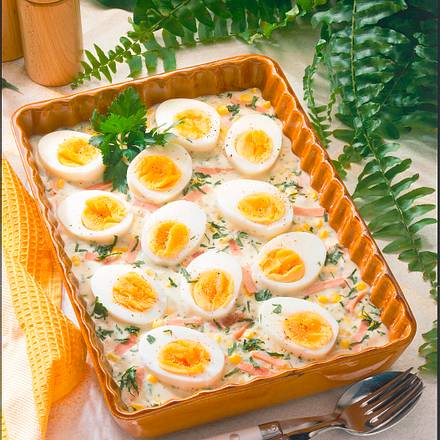 Eier in Kräuter-Schinkensoße Rezept Eier in Kräuter-Schinkensoße Rezept