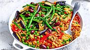 „Es grünt so grün“-Paella mit Erbsen und Bohnen Rezept - Foto: Are Media Syndication 