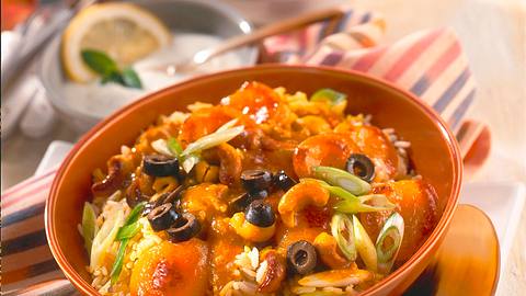 Exotisches Reisgericht mit Minz-Joghurtsoße Rezept - Foto: Maass