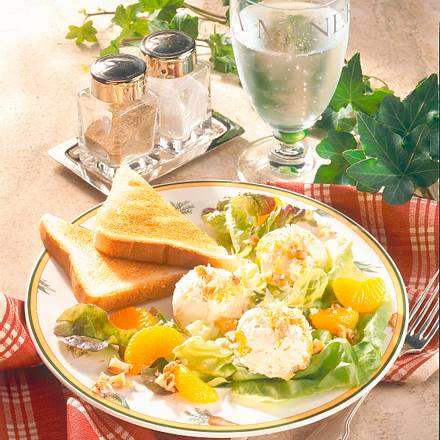 Frischkäse-Kugeln mit Mandarinen Rezept Frischkäse-Kugeln mit Mandarinen Rezept