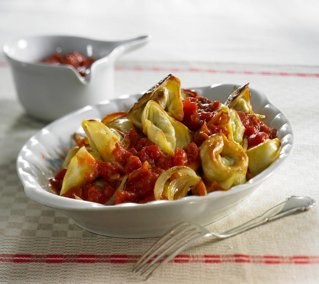 Gebratene Tortelloni (Ricotta e Spinaci) in Tomaten-Ingwersoße Rezept