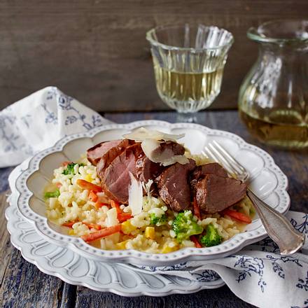 Gemüse-Risotto mit glasiertem Balsamico-Schweinefilet Rezept Gemüse-Risotto mit glasiertem Balsamico-Schweinefilet Rezept
