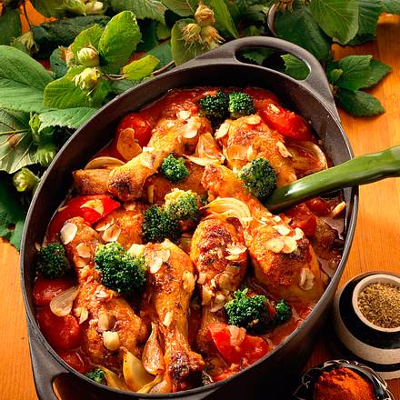 Geschmorte Hähnchenkeulen mit Haselnüssen Rezept