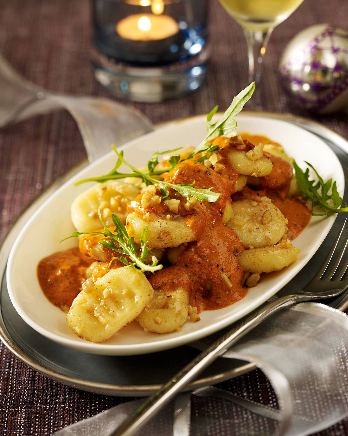 Gnocchi mit Tomaten-Orangen-Sahne und Walnüssen Rezept