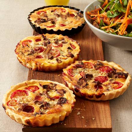 Gorgonzola-Tarteletts mit Pilzen und Tomaten Rezept