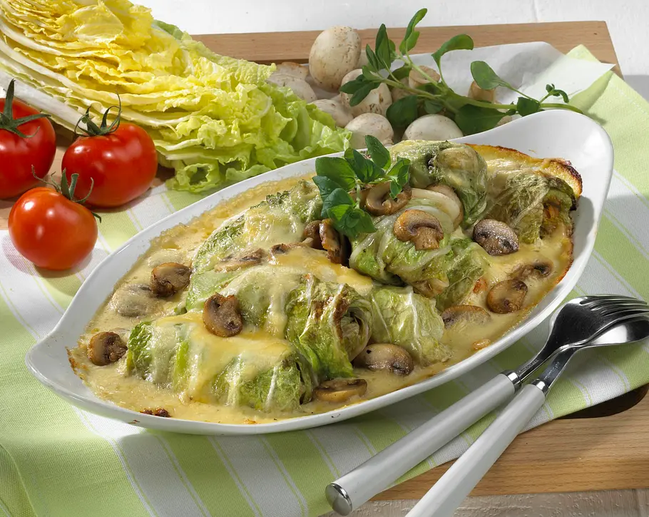 Gratinierte Chinakohl-Röllchen mit Reisfüllung Rezept Gratinierte Chinakohl-Röllchen mit Reisfüllung Rezept