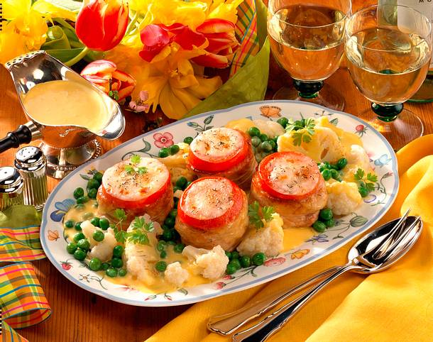 Gratinierte Putenmedaillons mit Tomate und Mozzare Rezept Gratinierte Putenmedaillons mit Tomate und Mozzare Rezept