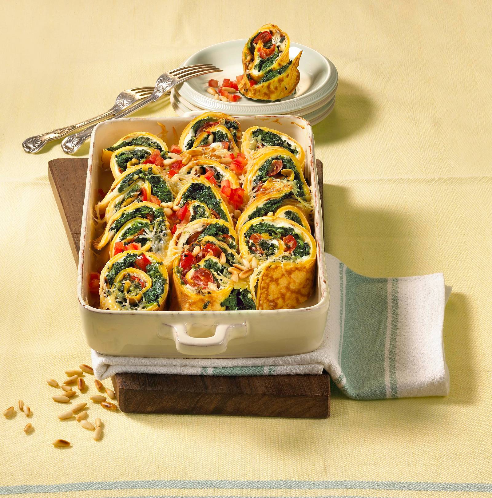 Gratinierte Spinat-Pfannkuchen Rezept | LECKER