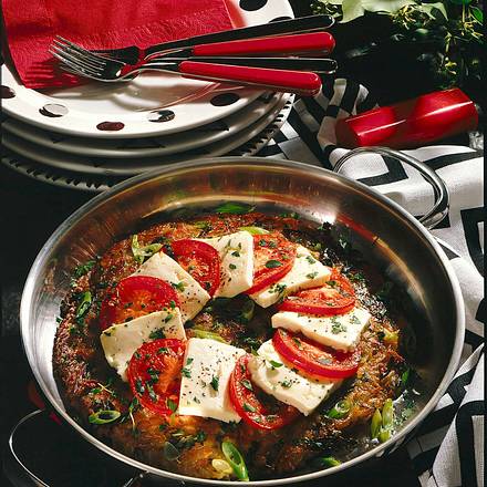 Großer Kartoffelrösti mit Tomate und Schafskäse Rezept