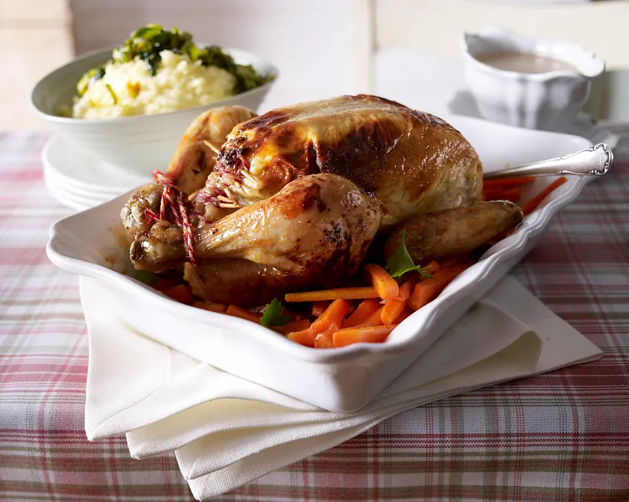 Hähnchen, gefüllt mit Kräuterfrischkäse, und Kartoffelpüree mit karamellisiertem Lauch Rezept Hähnchen, gefüllt mit Kräuterfrischkäse, und Kartoffelpüree mit karamellisiertem Lauch Rezept