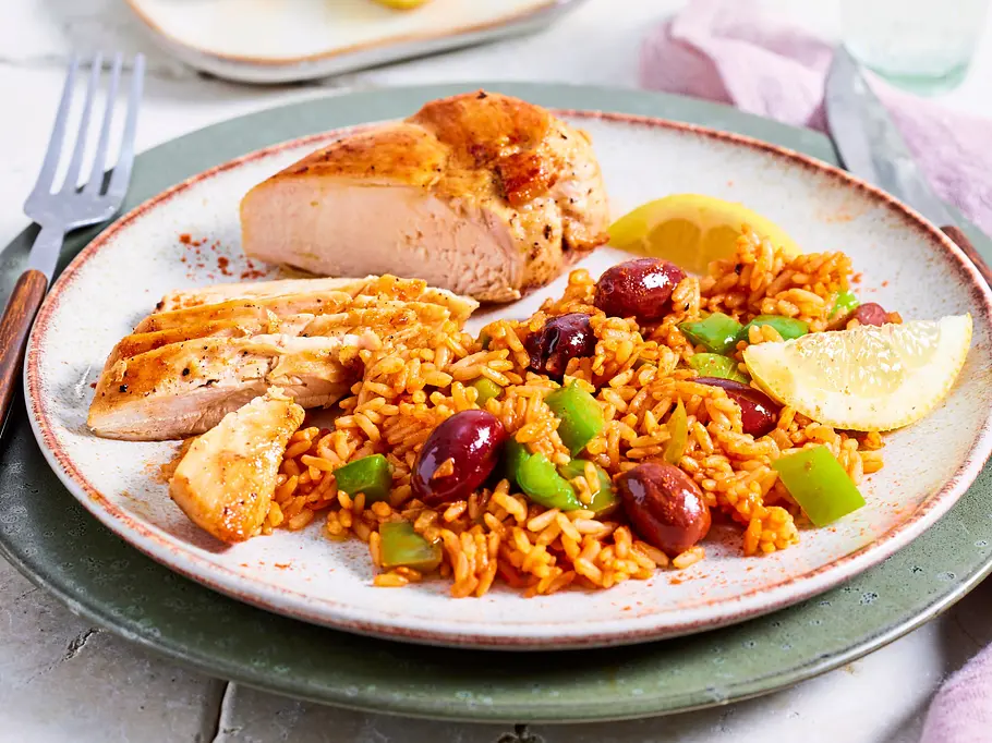 Hähnchen zu griechischem Tomatenreis Rezept Hähnchen zu griechischem Tomatenreis Rezept
