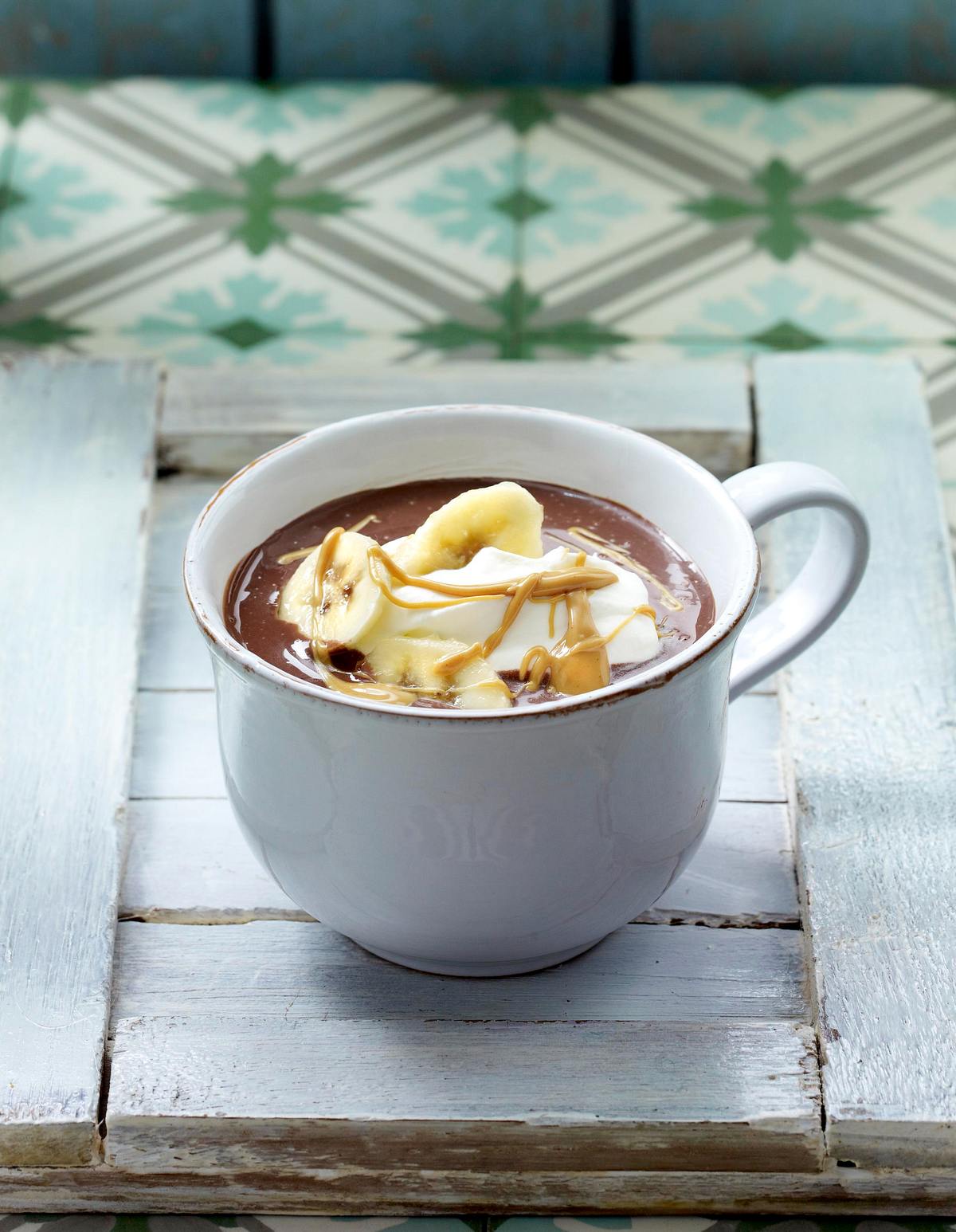 Heiße Schokolade 6x anders (man nehme...): Mit Kokosmilch, Karamellsirup und Kokosraspeln Rezept