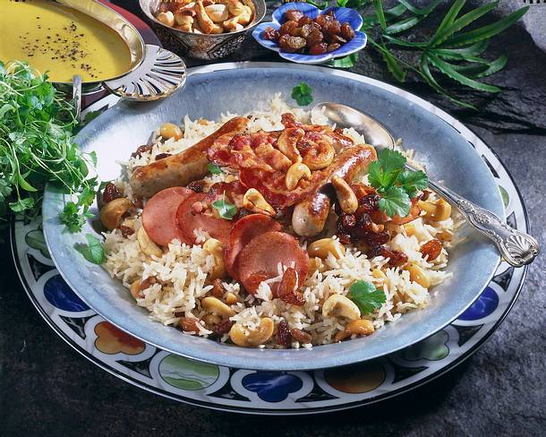 Indische Reisplatte mit Würstchen Rezept Indische Reisplatte mit Würstchen Rezept