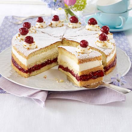 Käse-Sahnetorte (Mandelbiskuit) mit Kirschkompott Rezept Käse-Sahnetorte (Mandelbiskuit) mit Kirschkompott Rezept