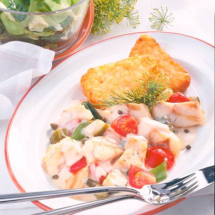 Kartoffelrösti mit Fischgulasch Rezept Kartoffelrösti mit Fischgulasch Rezept