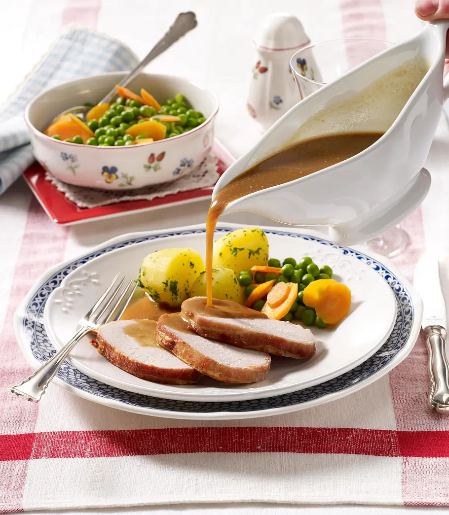 Kotelettbraten mit Weißwein-Sahne-Soße Rezept Kotelettbraten mit Weißwein-Sahne-Soße Rezept