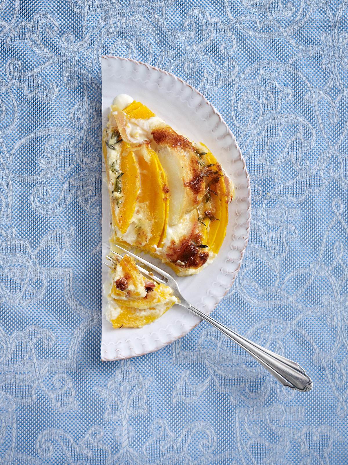 Kürbisgratin mit Apfelspalten Rezept