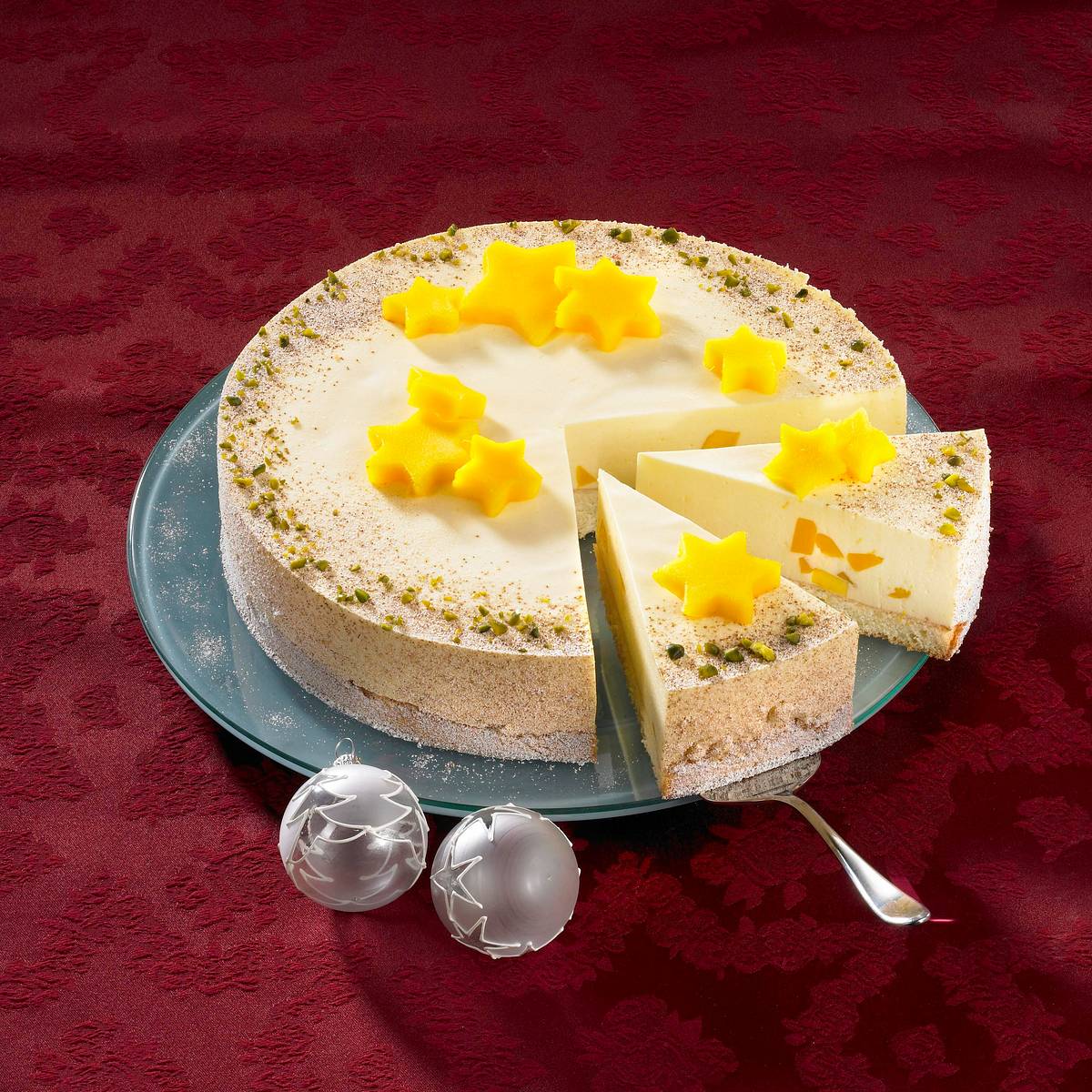 Leichte weihnachtliche Mango-Biskuittorte Rezept