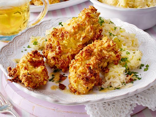 Ofenschnitzel mit Rahmkrautpüree Rezept Ofenschnitzel mit Rahmkrautpüree Rezept