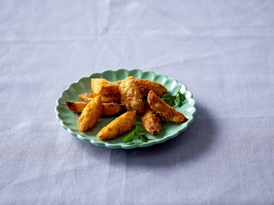 Panierte Kartoffelspalten Rezept Panierte Kartoffelspalten Rezept