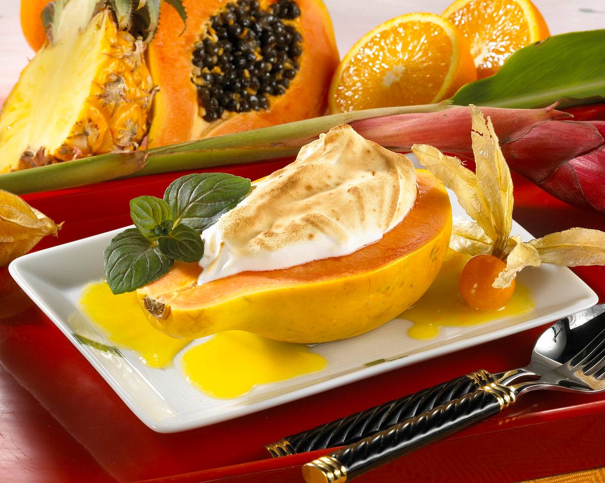 Papaya mit Baiserhaube und Orangensoße Rezept