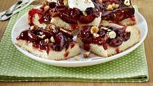 Pflaumenkuchen vom Blech mit Mandelblättchen und Zimt-Zucker Rezept - Foto: House of Food / Bauer Food Experts KG