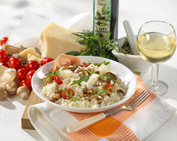 Pilzrisotto mit Rauke, Tomaten und Parmesan Rezept Pilzrisotto mit Rauke, Tomaten und Parmesan Rezept