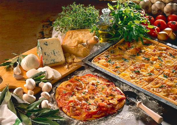 Pizza mit Pilzen und Parmaschinken Rezept