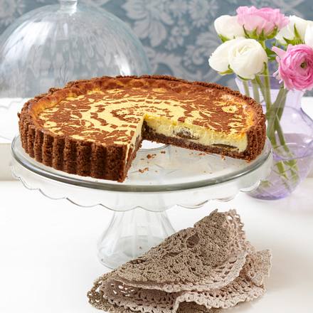 Polenta-Orangen-Käsekuchen mit Pinienkernen Rezept