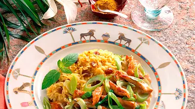 Putengeschnetzeltes mit Curry-Rosinen-Reis Rezept - Foto: LECKER @ Bauer Media Group