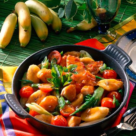 Putenpfanne mit Lauchzwiebeln und Kirschtomaten Rezept