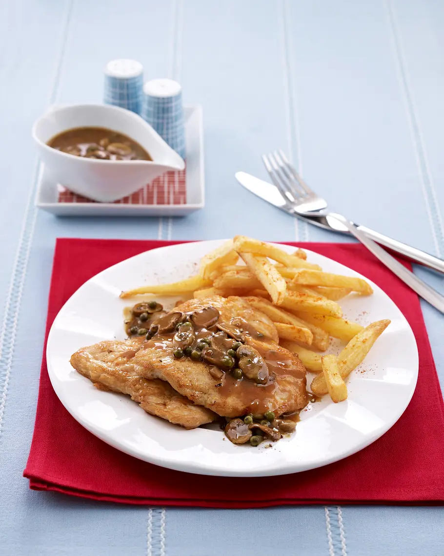 Putenschnitzel in Pilzsoße mit Pommes Frites Rezept Putenschnitzel in Pilzsoße mit Pommes Frites Rezept