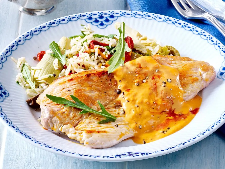 Putenschnitzel mit Blitz-Reispfanne Rezept Putenschnitzel mit Blitz-Reispfanne Rezept