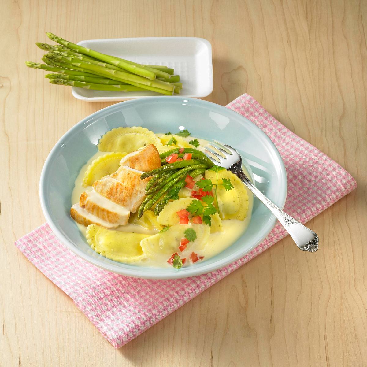 Ravioli mit grünem Spargel in Weißweinsoße Rezept