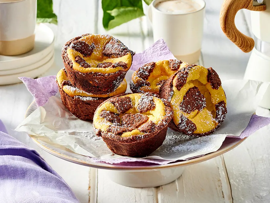 Saftige Zupfkuchen-Muffins Rezept Saftige Zupfkuchen-Muffins Rezept