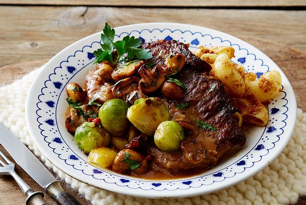 Schmorsteaks à la Almhütte in Rotwein-Pilz-Soße Rezept