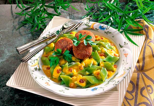 Schneidebohnen in Curry-Joghurtsoße mit Rosinen Rezept Schneidebohnen in Curry-Joghurtsoße mit Rosinen Rezept