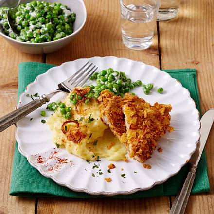 Schnitzel in Taco-Panade mit Erbsen-Rahmgemüse und Kartoffelstampf Rezept