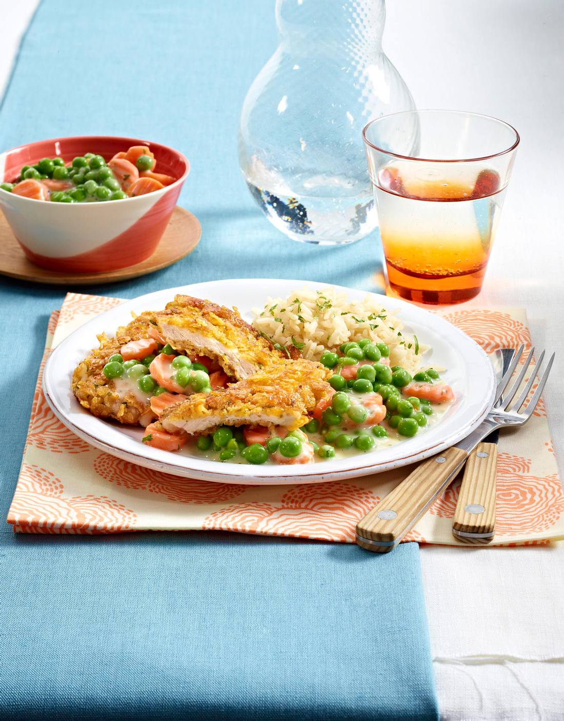 Schnitzel mit Rahmgemüse und Reis Rezept | LECKER