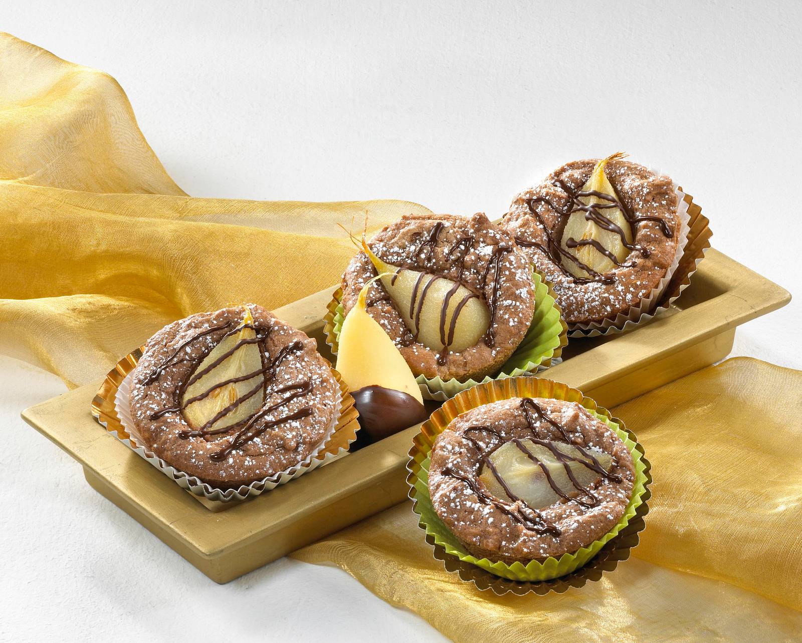 Schoko-Birnen-Muffins Rezept | LECKER