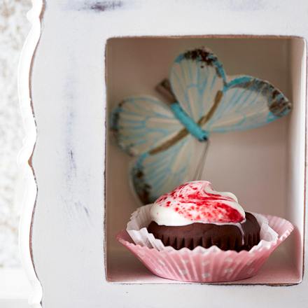 Schoko-Muffins mit gestrudelter Himbeercreme Rezept
