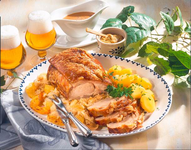 Schweinebraten mit Ananas-Kraut Rezept Schweinebraten mit Ananas-Kraut Rezept
