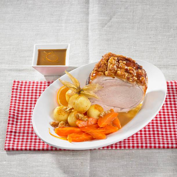 Schweinekrustenbraten mit Orangen-Möhren Rezept Schweinekrustenbraten mit Orangen-Möhren Rezept