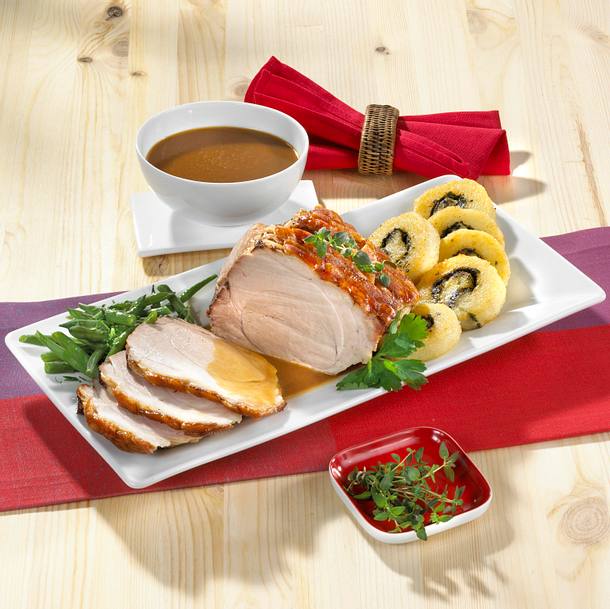 Schweinekrustenbraten mit Thymian-Kartoffeltalern Rezept